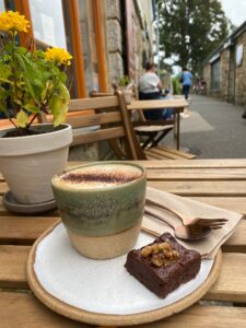 A steaming cup of the best coffee in Helston, served in a cozy setting at The Coffee Hut, showcasing the quality and warmth of our offerings.
