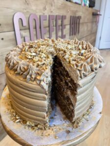 A colourful vegan lunch spread at The Coffee Hut in Helston, featuring fresh, locally sourced ingredients in a variety of delicious dishes.